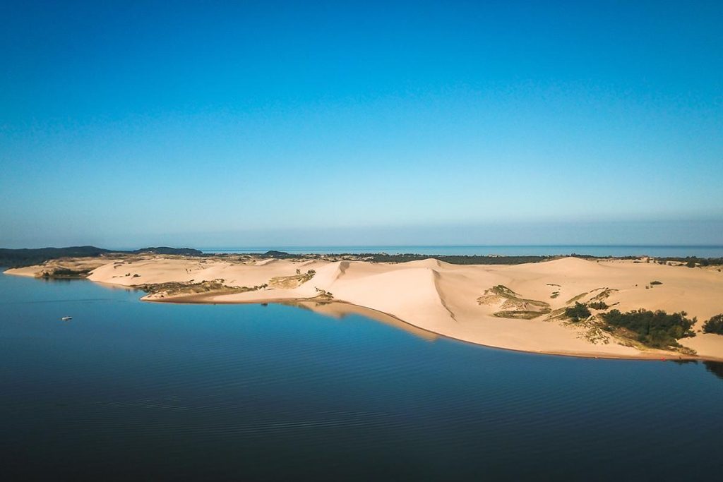 Oceana County Michigan real estate featuring Lake Michigan shoreline, Silver Lake Sand Dunes, orchards, and residential communities